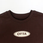 Brown Oval Badge T-Shirt on model — OTTA Kids