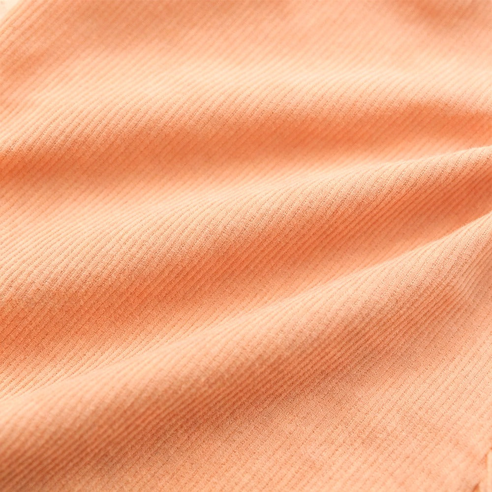 Peach Cord Shorts fabric close up — OTTA Kids